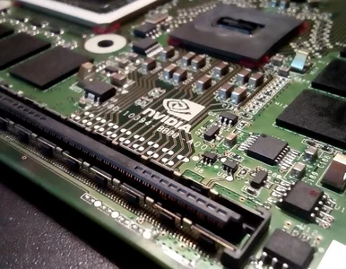 Miniatura: Złota fala AI niesie Nvidię na giełdowy...