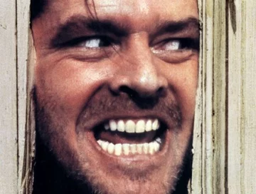 Z czym zmagał się w przeszłości Jack Torrance z filmu i powieści "Lśnienie"?